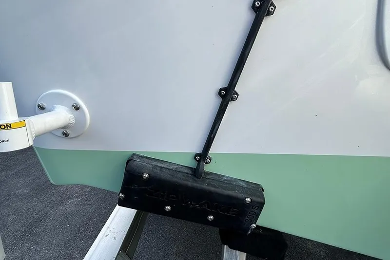 Slide: The Image of 2026 Sea Pro 245FLX Sandbar boat hull with attached hardware. - 47