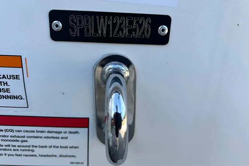 Slide: The Image of 2026 Sea Pro 245FLX Sandbar boat identification plate and safety warning label. - 48