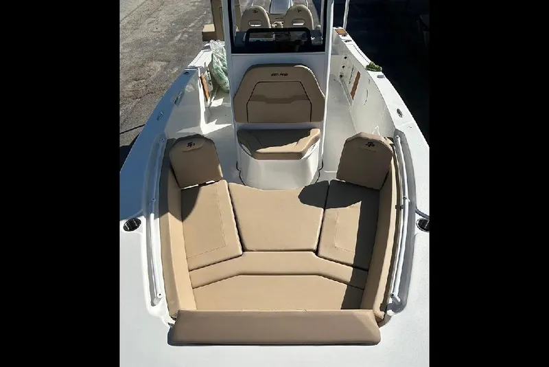 Slide: The Image of 2026 Sea Pro 245FLX Sandbar boat with tan seating and sleek design. - 51