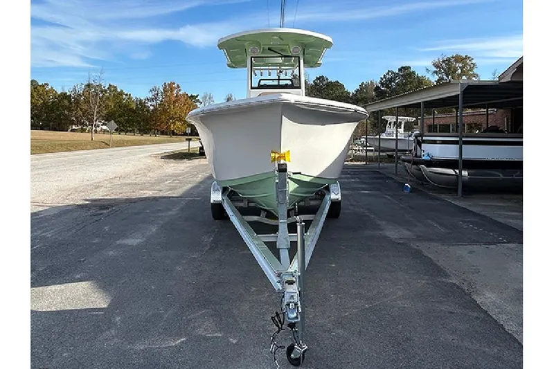 Slide: The Image of 2026 Sea Pro 245FLX Sandbar boat on trailer, parked outdoors. - 7