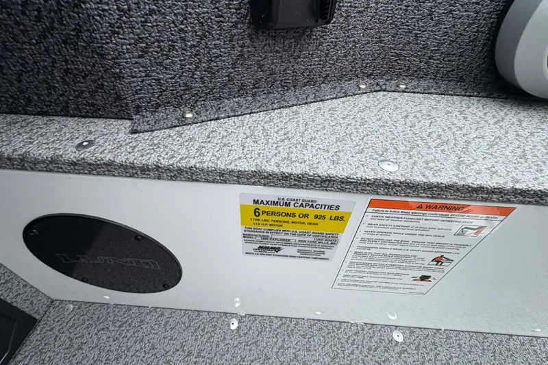 Slide: The Image of 2026 Lund 1800 Explorer Sport boat capacity label, maximum 6 persons or 925 lbs. - 20