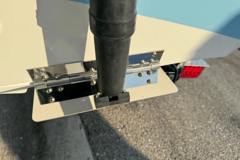 Slide: The Image of 2024 Sea Pro 202 Center Console boat detail with hinge and rod holder. - 11