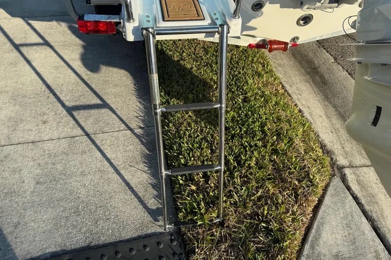 Slide: The Image of 2024 Sea Pro 202 Center Console boat ladder with logo, stainless steel frame. - 18