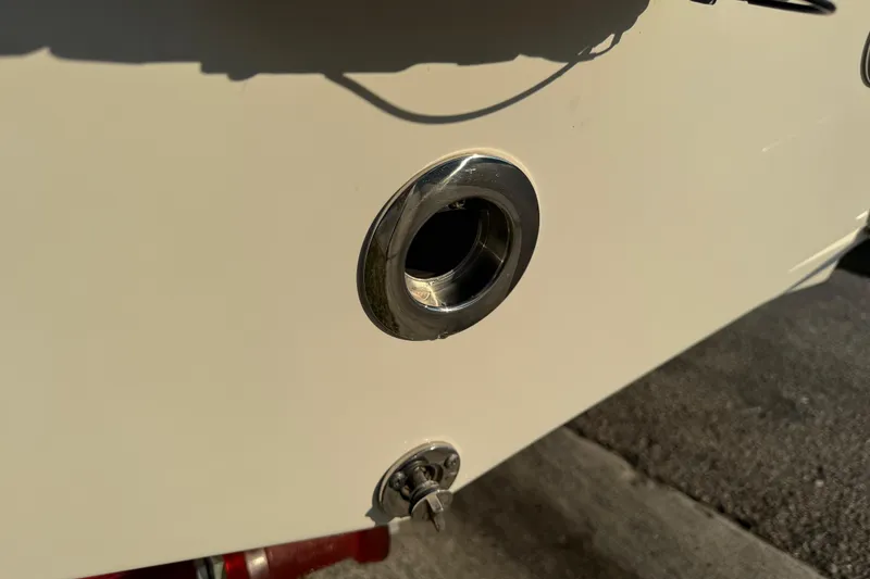 Slide: The Image of Close-up of 2024 Sea Pro 202 Center Console boat detail, featuring a chrome fitting. - 21