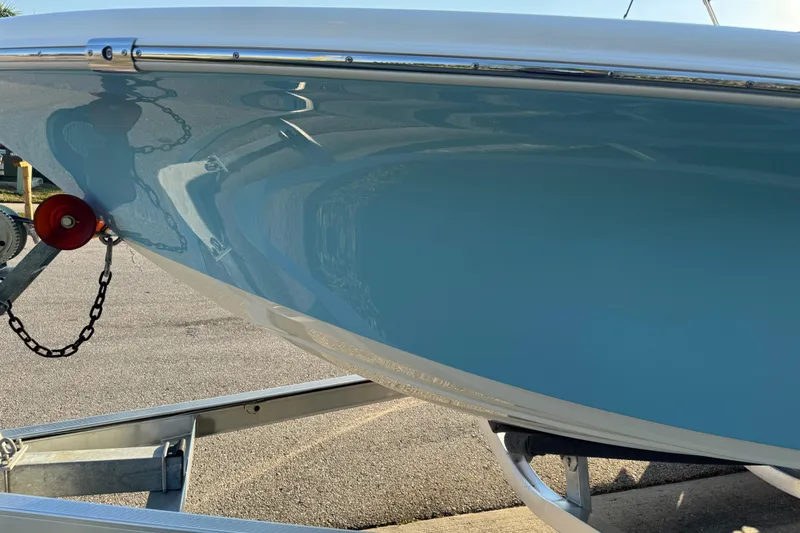 Slide: The Image of 2024 Sea Pro 202 Center Console boat on trailer, side view. - 33