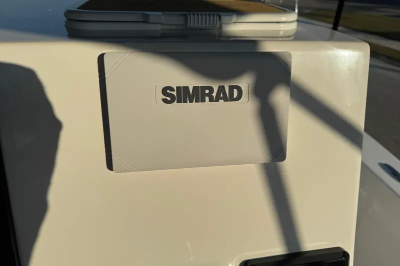 Slide: The Image of 2024 Sea Pro 202 Center Console boat deck with logo in sunlight. - 39