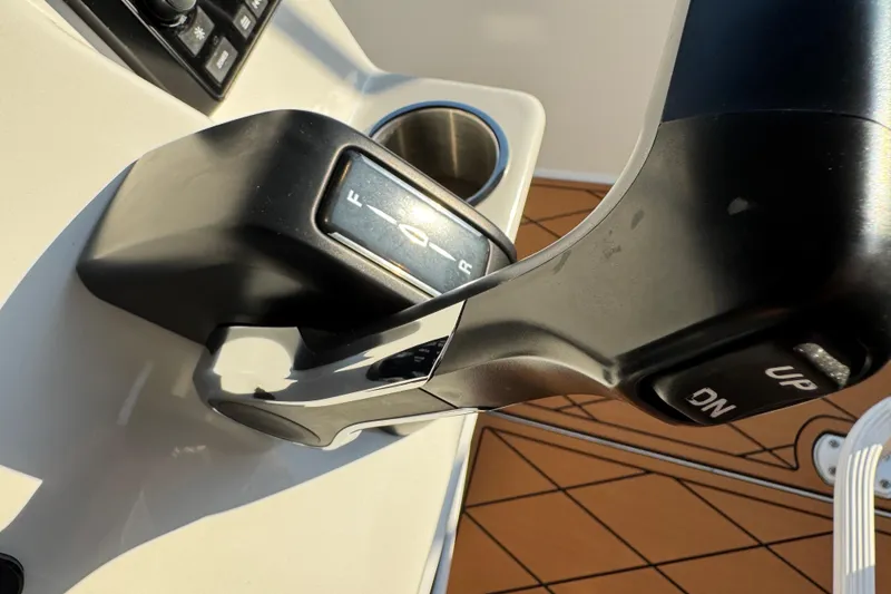 Slide: The Image of Control panel on 2024 Sea Pro 202 Center Console boat, featuring Lectrotab trim tab controls. - 44