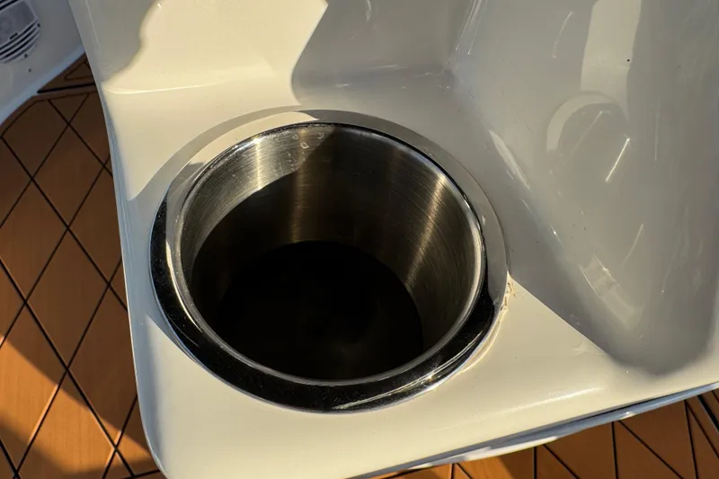 Slide: The Image of Ignition key in Suzuki panel of 2024 Sea Pro 202 Center Console boat. - 45