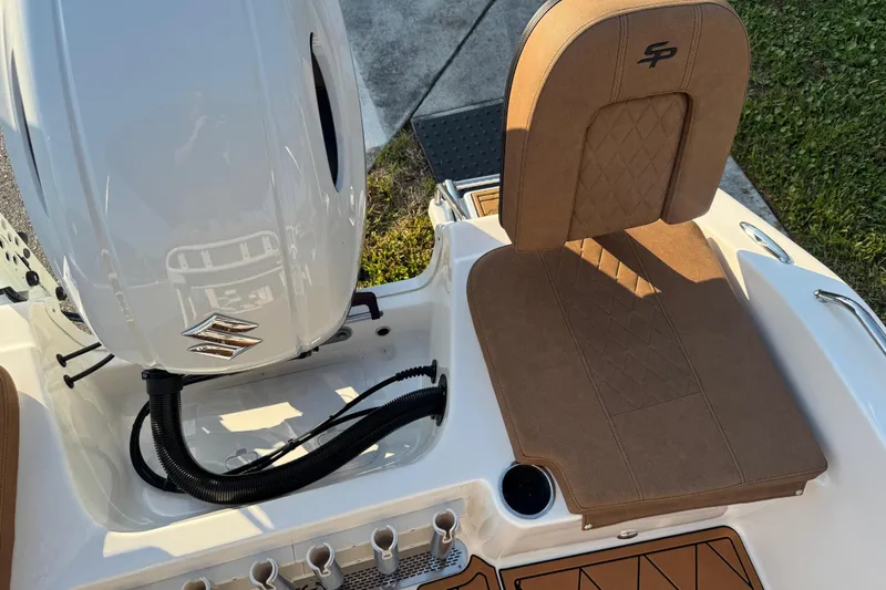 Slide: The Image of 2024 Sea Pro 202 Center Console boat deck with cushioned seating and diamond-patterned flooring. - 59