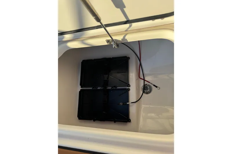 Slide: The Image of 2024 Sea Pro 202 Center Console boat interior with cushioned seating and stylish flooring. - 69