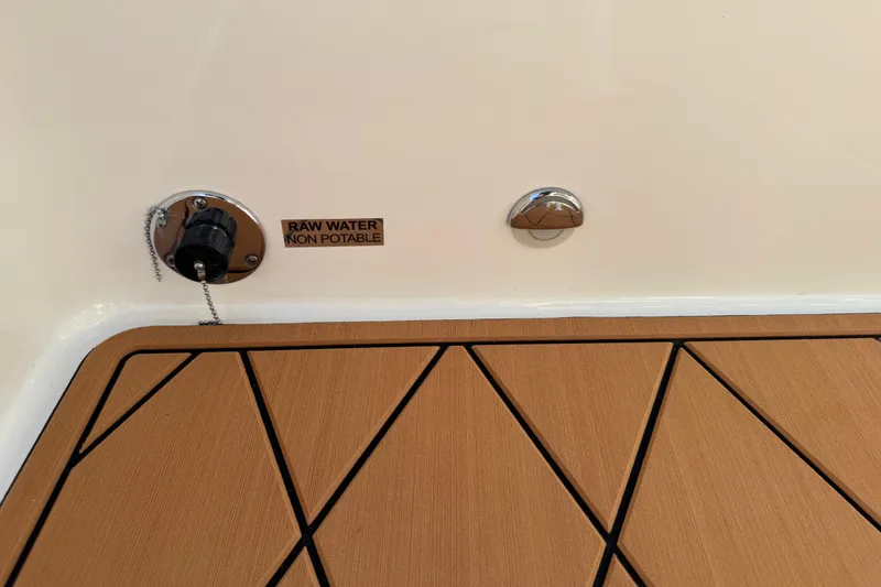 Slide: The Image of 2024 Sea Pro 202 Center Console boat deck with diamond-patterned flooring. - 75