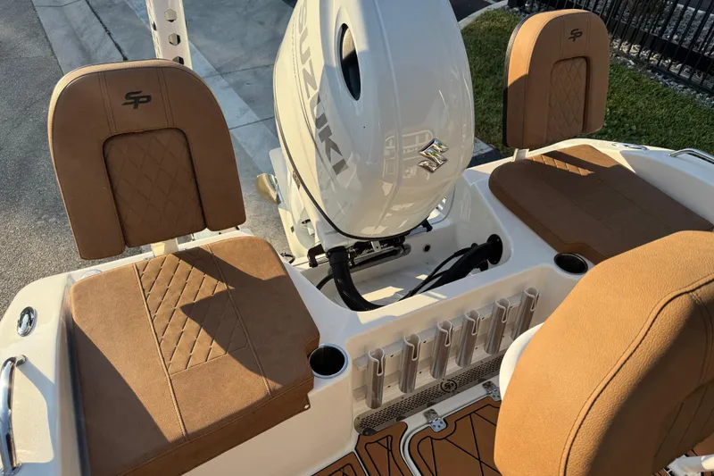 Slide: The Image of 2024 Sea Pro 202 Center Console interior with logo on wooden panel. - 76