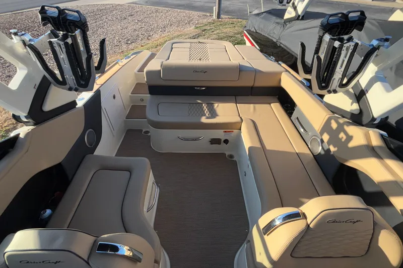 Slide: The Image of 2026 Chris-Craft Sportster 28 dashboard with modern steering wheel and digital display. - 28