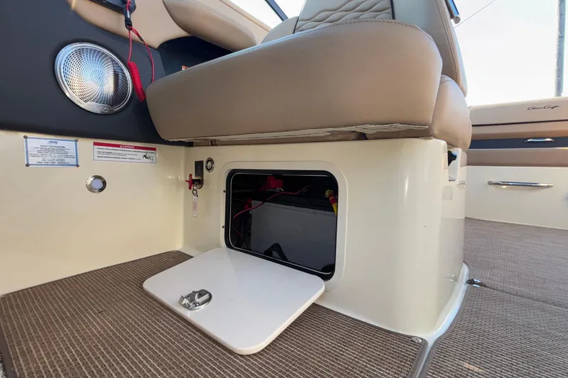 Slide: The Image of 2026 Chris-Craft Sportster 28 interior with tan seating and modern design. - 38