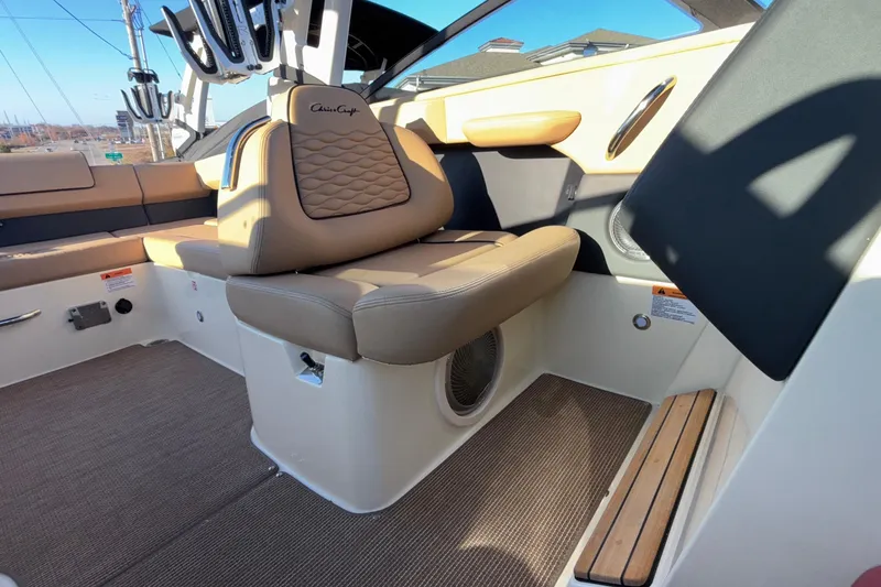 Slide: The Image of 2026 Chris-Craft Sportster 28 interior with luxurious seating and modern audio system. - 39