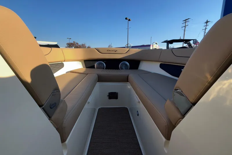 Slide: The Image of 2026 Chris-Craft Sportster 28 boat interior with beige seating and elegant design. - 47