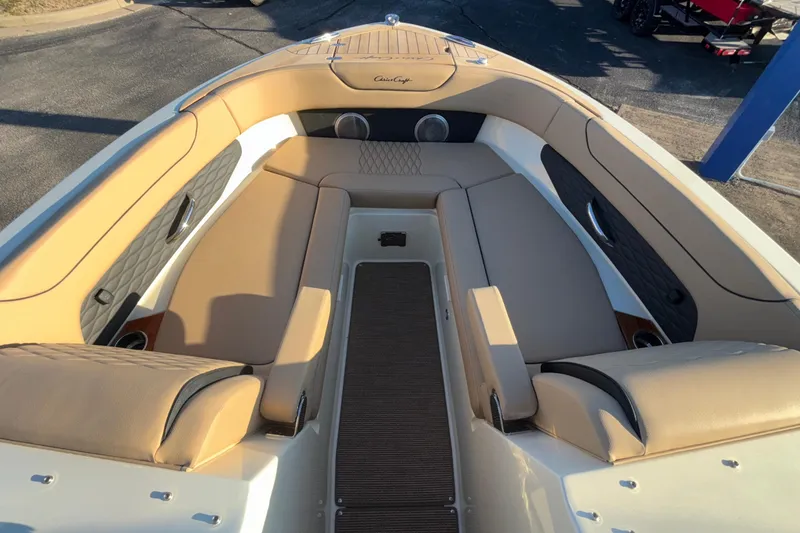 Slide: The Image of Luxurious interior of 2026 Chris-Craft Sportster 28 boat with tan leather seating. - 49