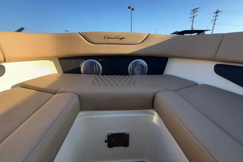 Slide: The Image of 2026 Chris-Craft Sportster 28 interior with beige seating and modern design elements. - 51