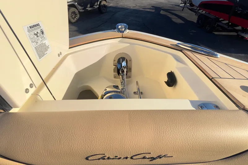 Slide: The Image of Anchor compartment of 2026 Chris-Craft Sportster 28 with chain and cleat. - 53