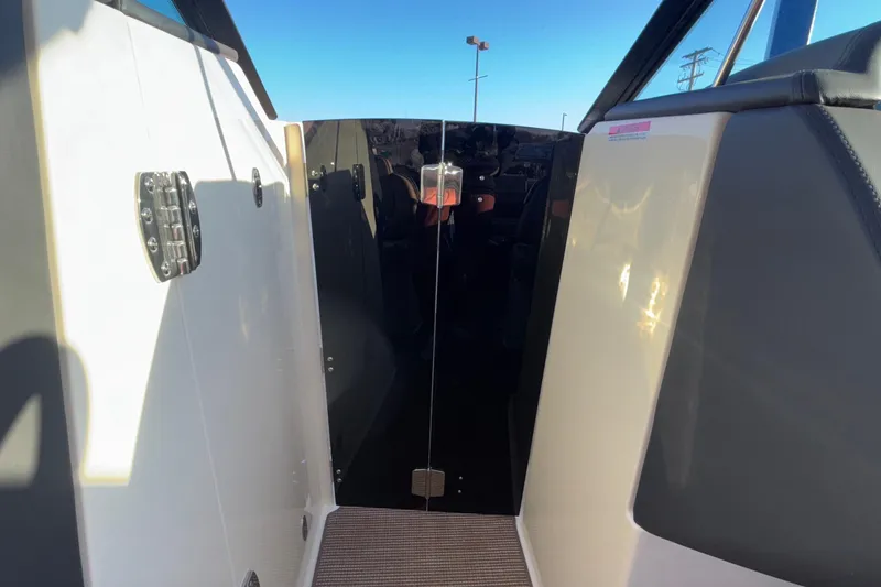 Slide: The Image of 2026 Chris-Craft Sportster 28 interior with beige seating and modern design. - 55