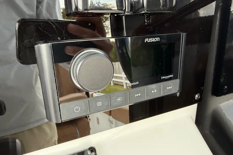 Slide: The Image of Fusion audio system on 2026 Sea Hunt Ultra 235 SE boat dashboard. - 18