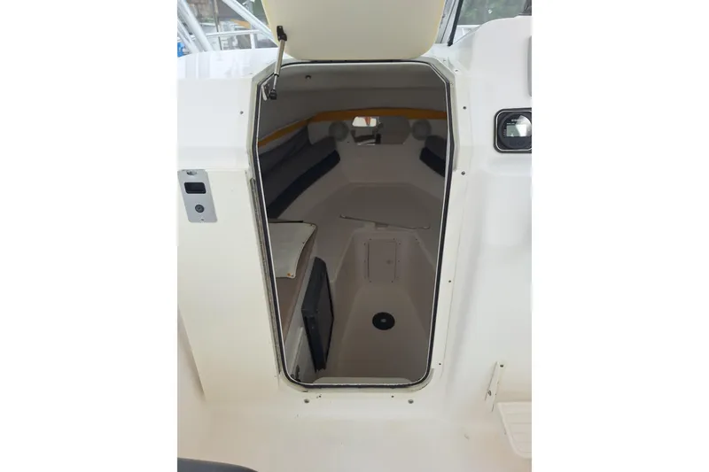 Slide: The Image of Interior cabin view of a 2006 Century 2400 Walkaround boat. - 12