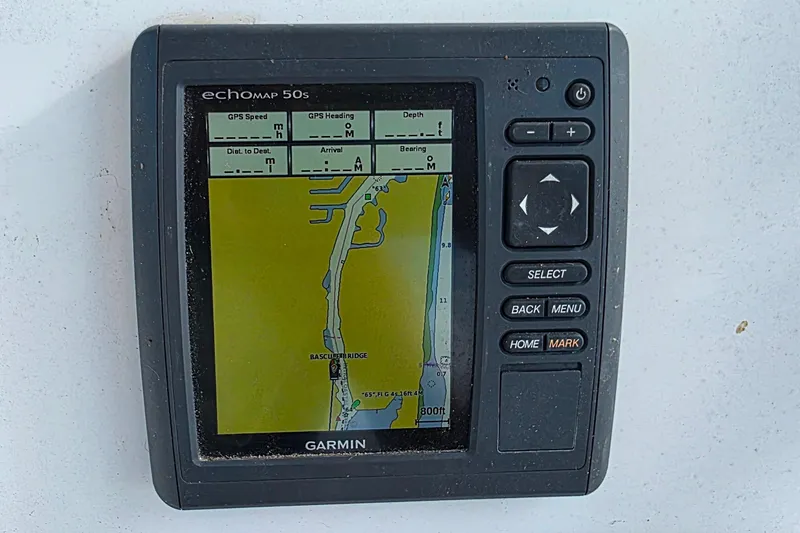 Slide: The Image of Garmin echoMAP 50s GPS device displaying a nautical map on a 2006 Century 2400 Walkaround. - 21