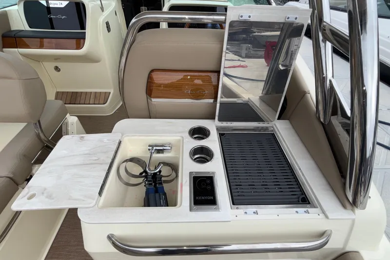Slide: The Image of Luxurious 2026 Chris-Craft Calypso 28 boat interior with modern amenities and sleek design. - 21