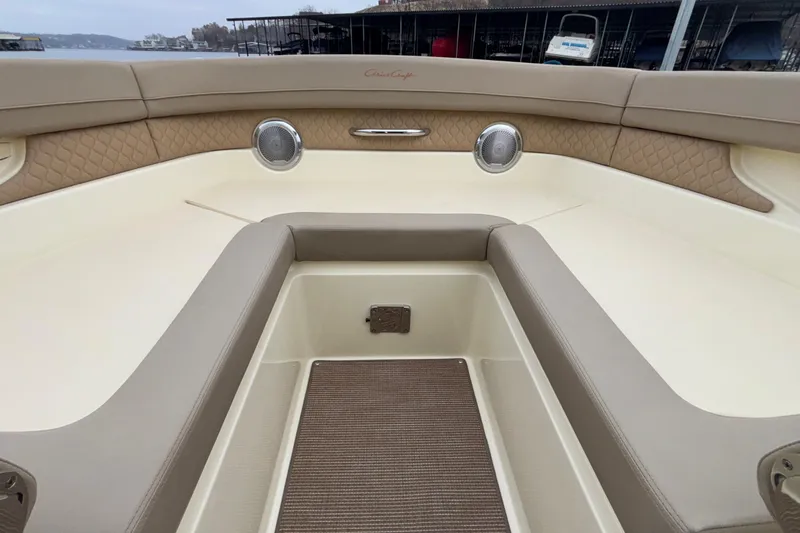 Slide: The Image of 2026 Chris-Craft Calypso 28 boat interior with beige seating and elegant design. - 45