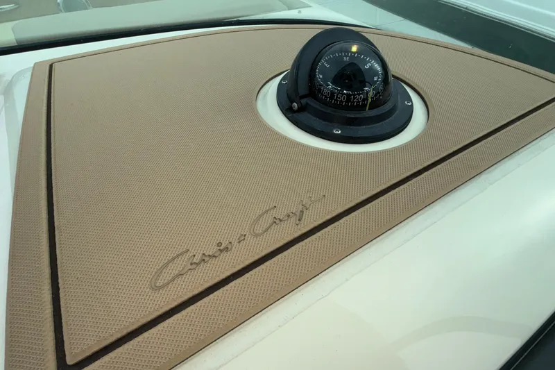 Slide: The Image of 2026 Chris-Craft Calypso 28 boat compass and logo detail. - 52