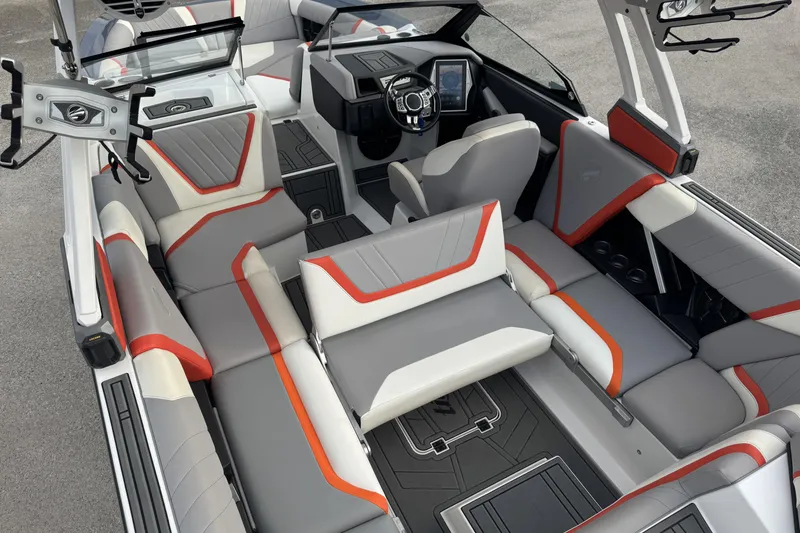 Slide: The Image of 2021 Tigé 23RZX boat interior with modern seating and sleek design. - 13
