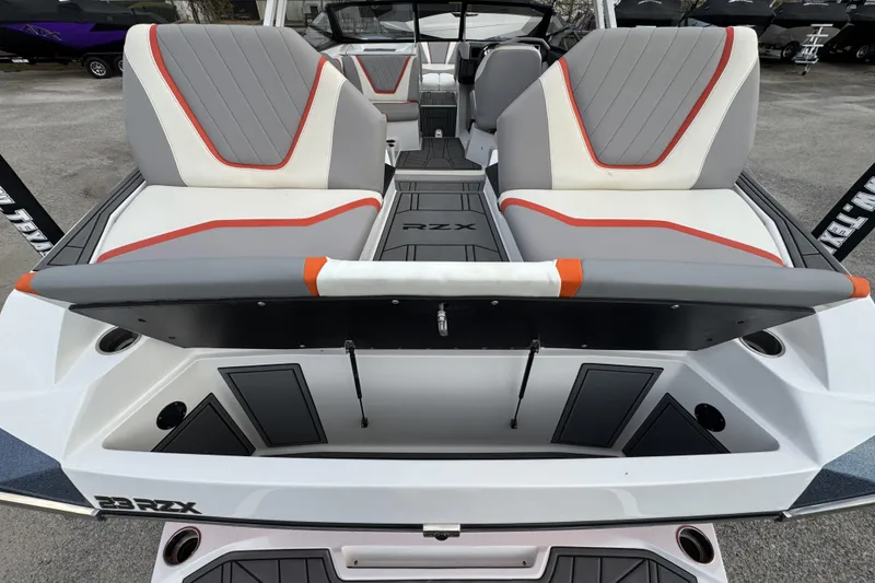 Slide: The Image of 2021 Tigé 23RZX boat interior with stylish seating and modern design. - 14