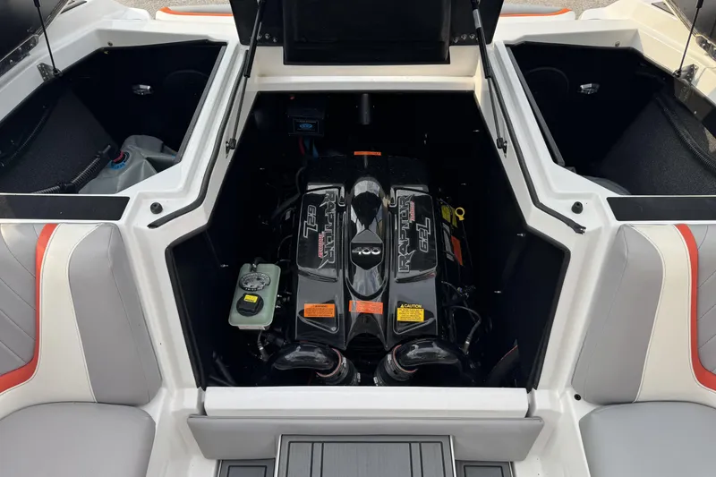 Slide: The Image of 2021 Tigé 23RZX boat engine compartment with Raptor 6.2L engine. - 16