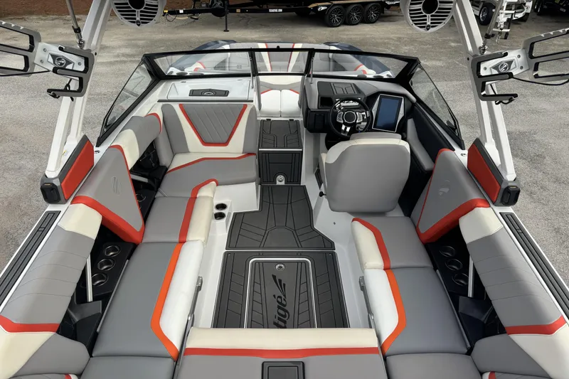 Slide: The Image of 2021 Tigé 23RZX boat interior with modern seating and advanced dashboard. - 6