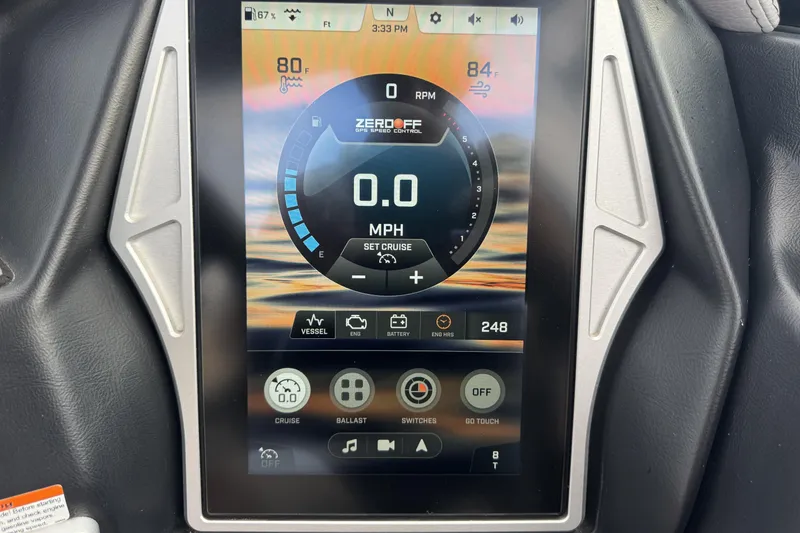 Slide: The Image of Touchscreen display of a 2021 Tigé 23RZX boat showing speed and control settings. - 8
