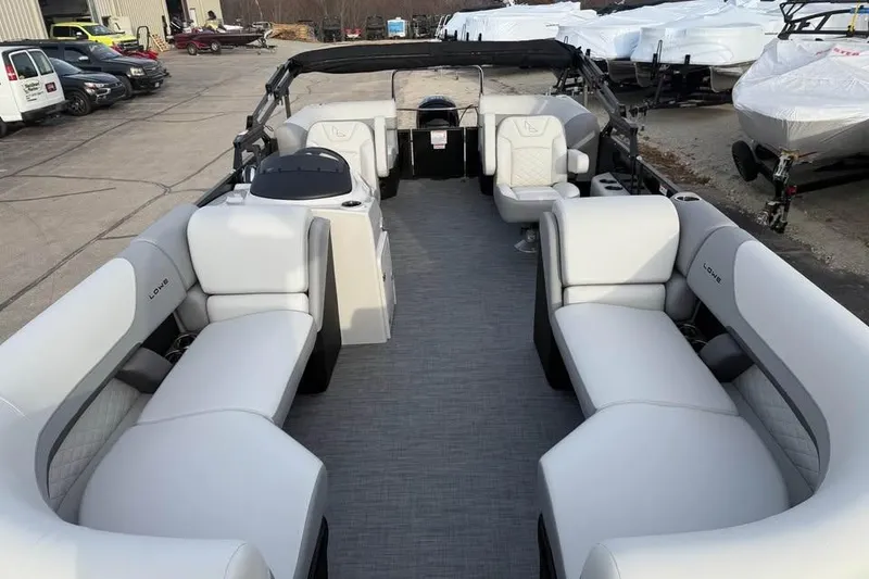 Slide: The Image of 2026 Lowe SS 230 WV pontoon boat with spacious seating and modern design. - 15