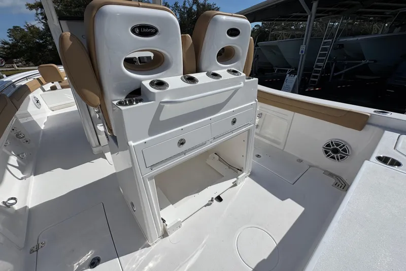 Slide: The Image of 2026 Caymas 291 boat interior with seating and storage compartments. - 36