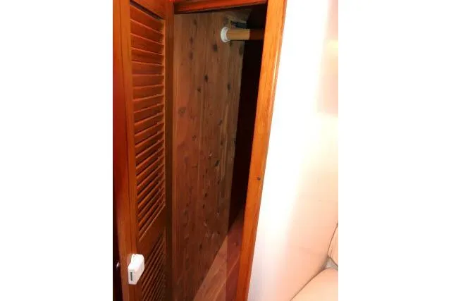 Slide: The Image of Wooden closet interior on a 2008 Catalina 400 MK II sailboat. - 27
