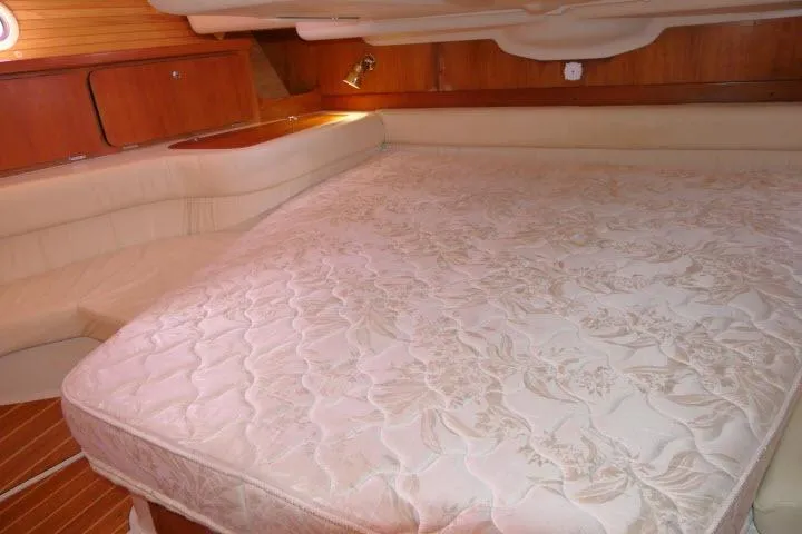 Slide: The Image of Luxurious cabin interior of 2008 Catalina 400 MK II sailboat with spacious bed. - 31