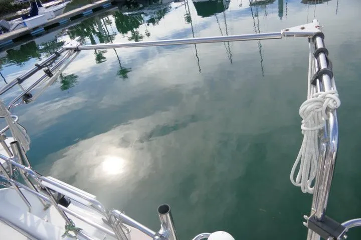 Slide: The Image of Catalina 400 MK II sailboat, 2008 model, docked with calm water reflection. - 56