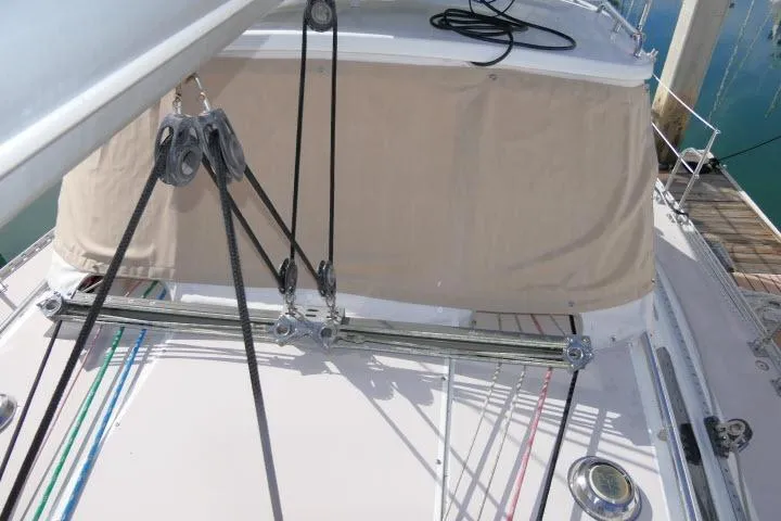 Slide: The Image of 2008 Catalina 400 MK II sailboat deck with rigging and canvas cover. - 59