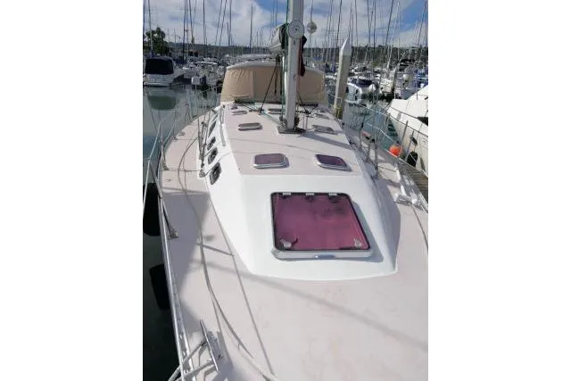 Slide: The Image of 2008 Catalina 400 MK II sailboat deck view in marina setting. - 62
