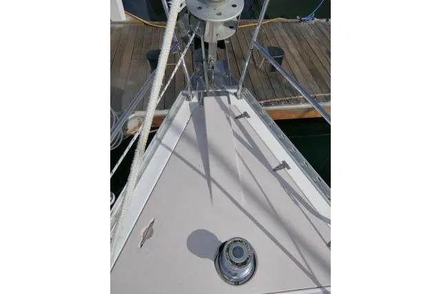 Slide: The Image of Bow of 2008 Catalina 400 MK II sailboat with winch and ropes. - 63