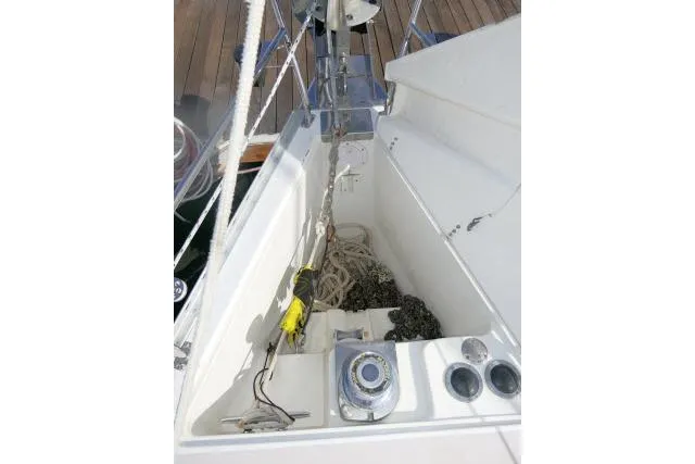 Slide: The Image of Anchor locker of 2008 Catalina 400 MK II sailboat with ropes and chains. - 64