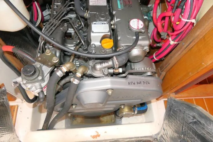 Slide: The Image of Engine compartment of a 2008 Catalina 400 MK II sailboat, showing detailed components. - 71