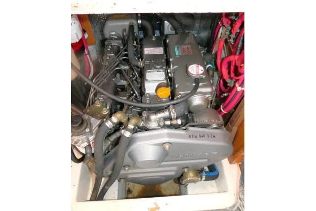 Slide: The Image of Engine compartment of a 2008 Catalina 400 MK II sailboat, showing detailed mechanical components. - 72