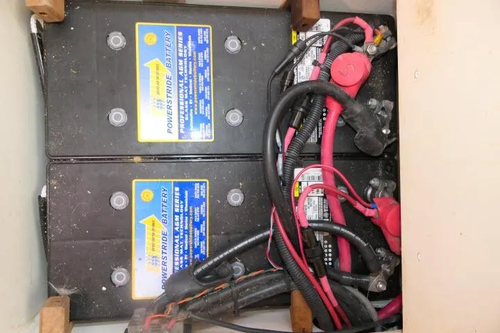 Slide: The Image of Batteries in a 2008 Catalina 400 MK II sailboat with connected cables. - 76