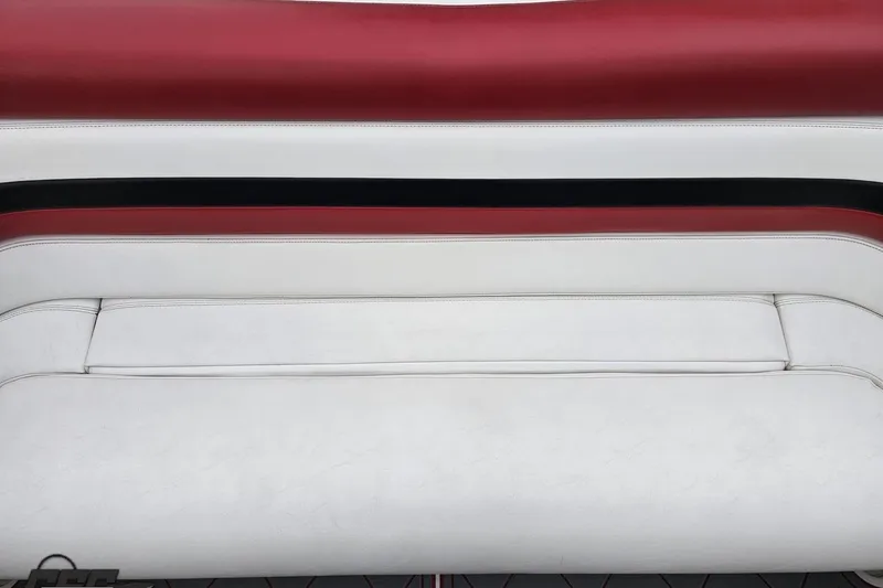 Slide: The Image of White and red boat seat from a 2004 Black Thunder 460. - 105