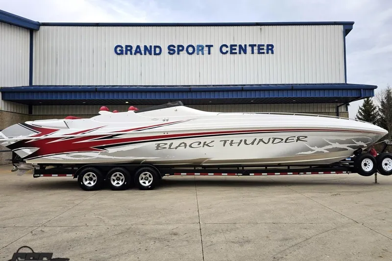 Slide: The Image of 2004 Black Thunder 460 speedboat on trailer at Grand Sport Center. - 2