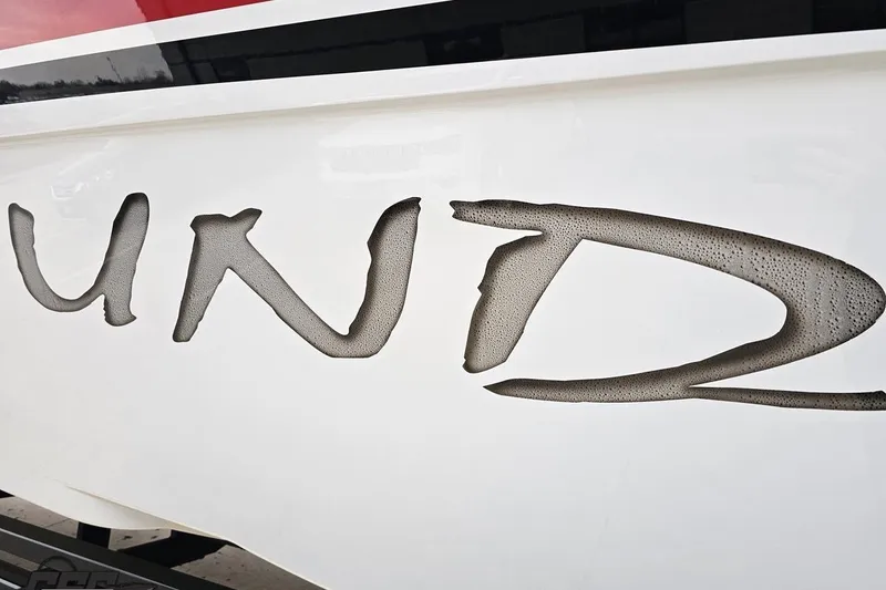 Slide: The Image of Close-up of 2004 Black Thunder 460 boat lettering detail. - 21